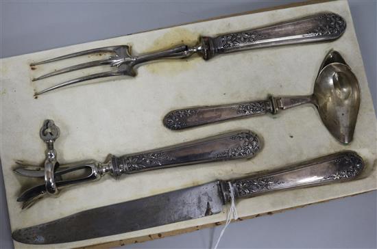 A French four-piece silver-handled carving set, circa 1900, in Lefebvre Fils fitted case (a.f.)
